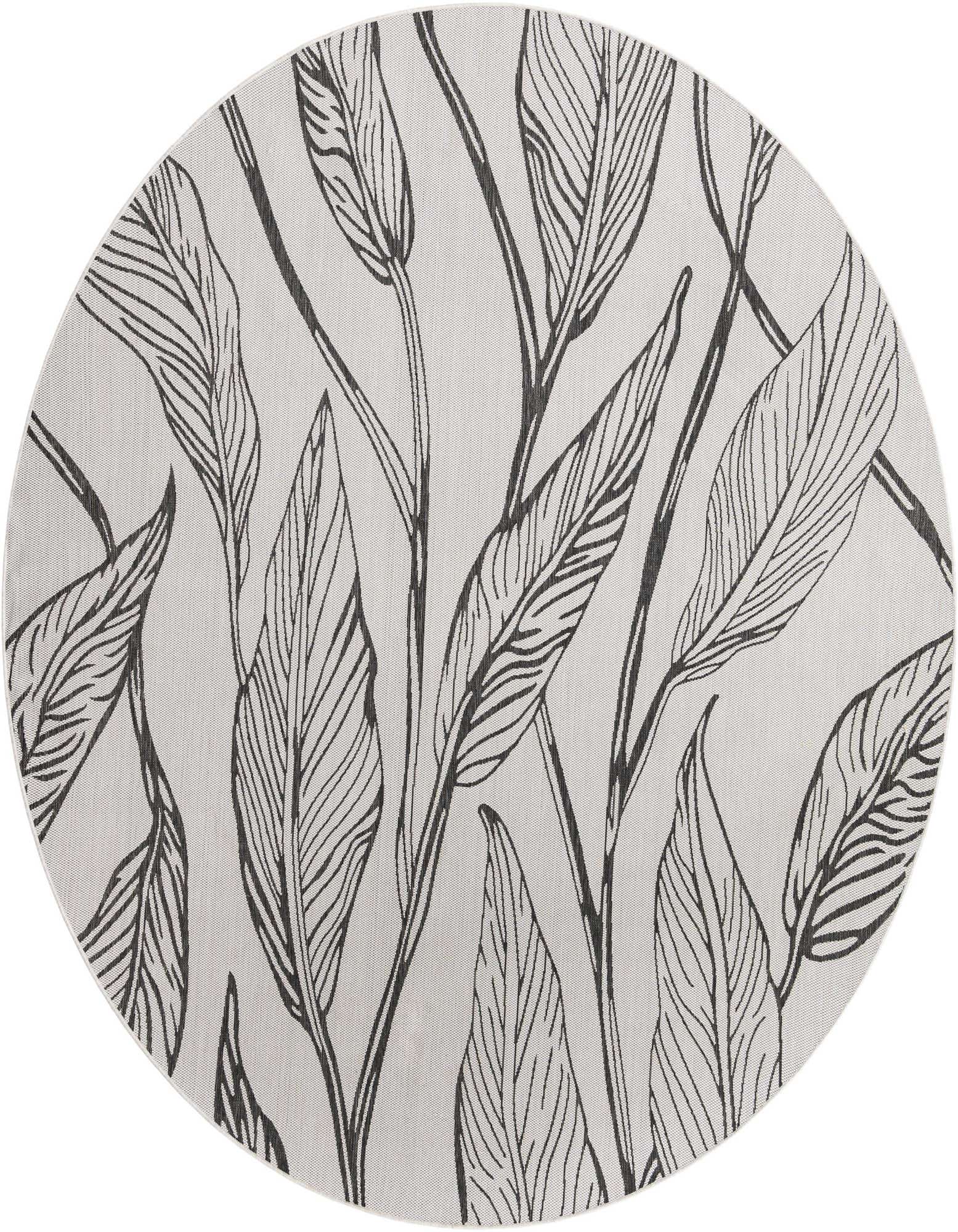 A large round charcoal and ivory flatweave rug with a modern botanical leaf pattern, suitable for indoor or outdoor use.