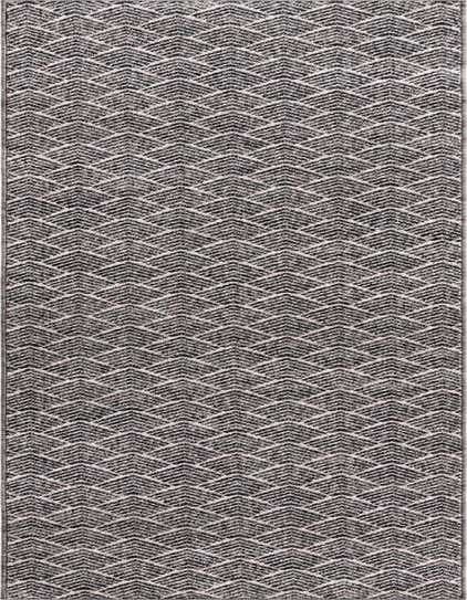 A 12 ft runner rug in charcoal and ivory, featuring a modern trellis pattern, ideal for hallways.