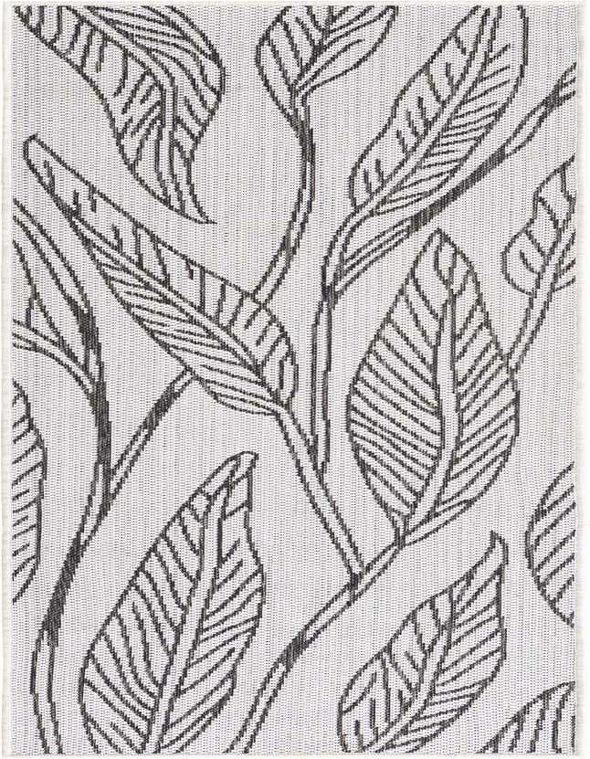 A 6 ft runner rug with a charcoal botanical leaf pattern on an ivory background, suitable for indoor/outdoor use.