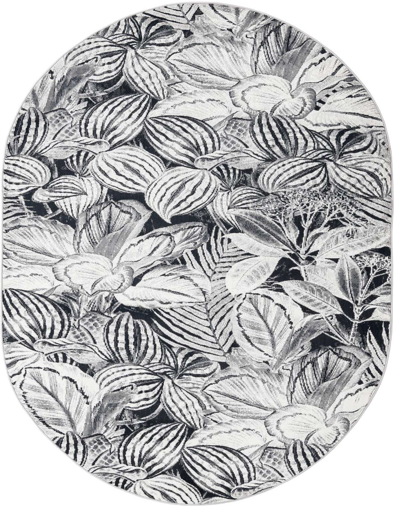 An oval 5' 3 x 7' 10 black and gray botanical rug featuring a modern floral pattern.
