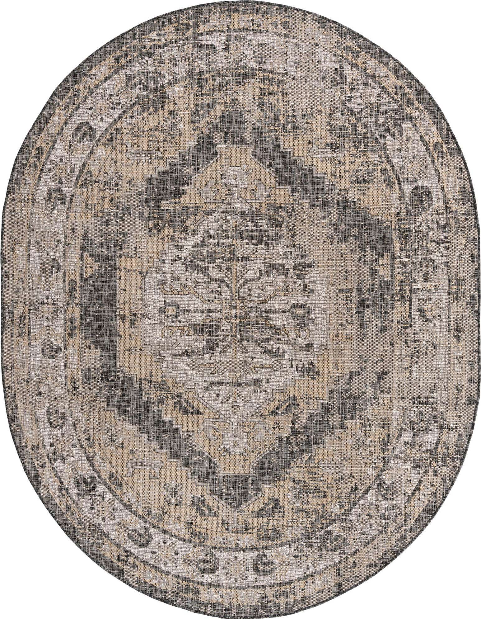 An oval 7'10" x 10'0" black and gray Southwestern style rug with a distressed traditional pattern, suitable for indoor or outdoor use.