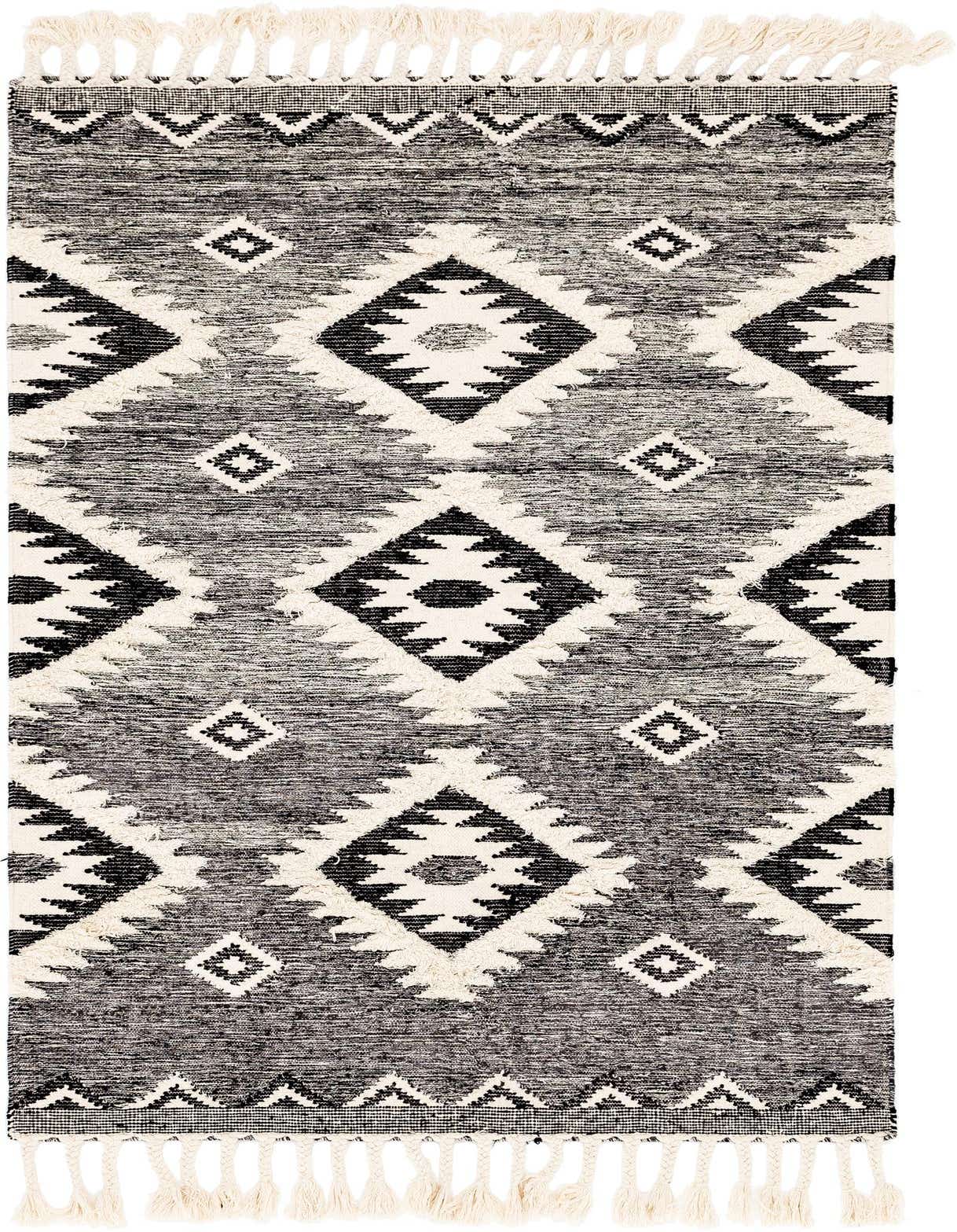 A 5x8 rectangular black and gray tribal bohemian wool shag rug with geometric diamond patterns and fringe.