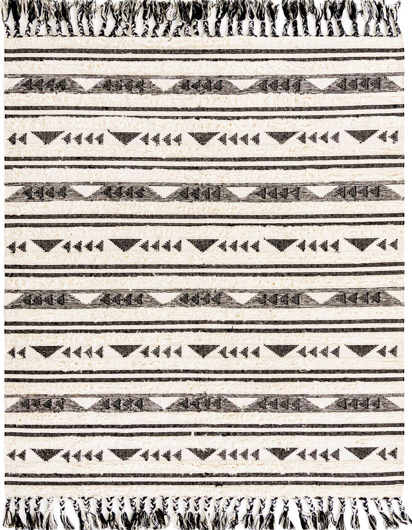 A rectangular 8x11 black and white tribal shag rug with horizontal stripes and geometric patterns, featuring braided tassels.
