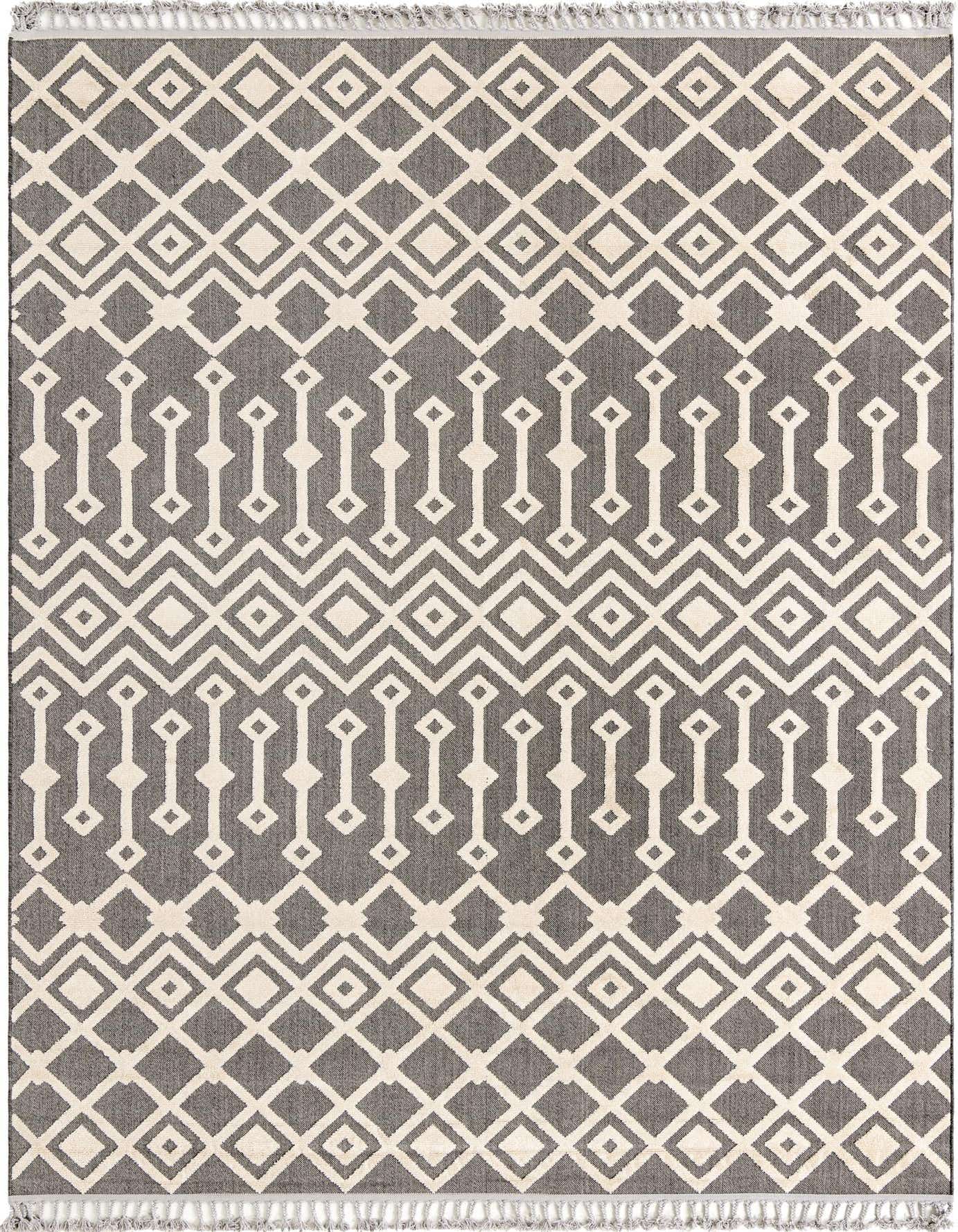 A 9x12 rectangular Arlo rug featuring a modern tribal pattern in black and off-white with textured high-low pile.