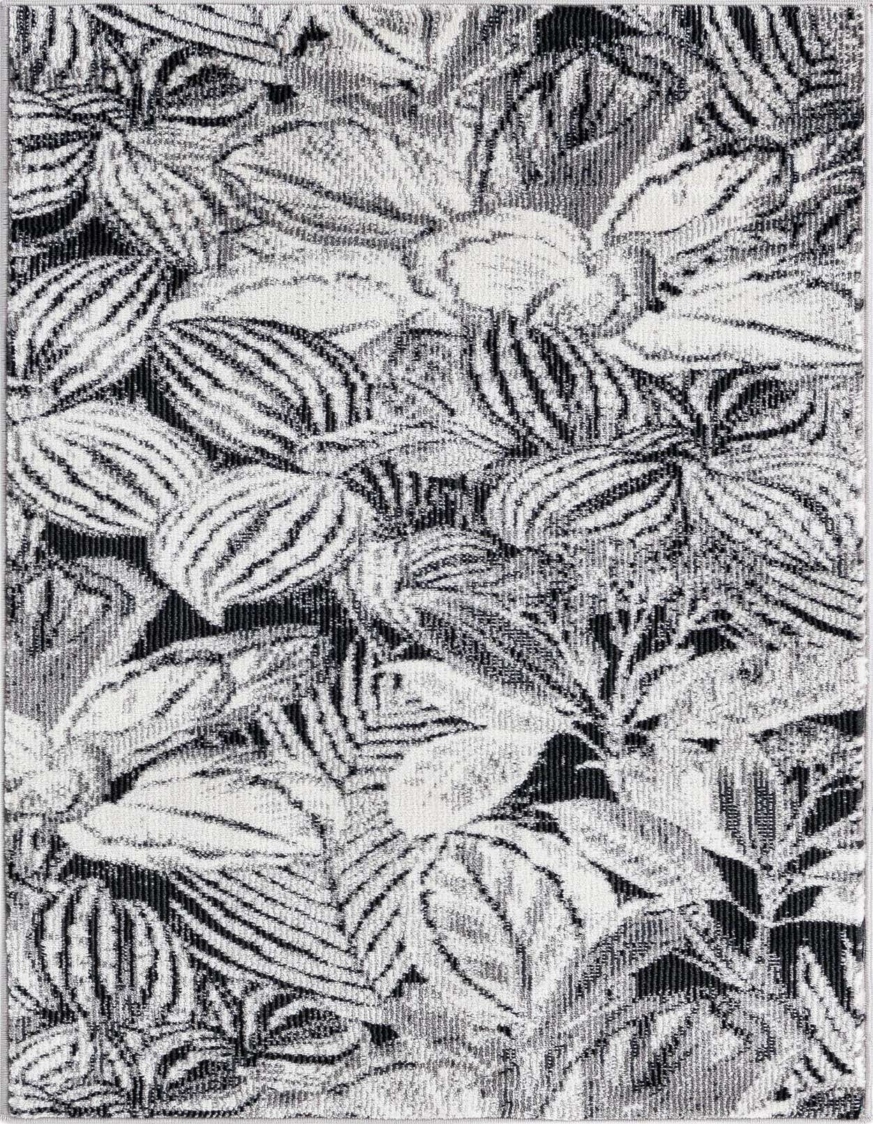 A 2x3 rectangular black and white botanical rug with a modern floral pattern, suitable for an entryway.