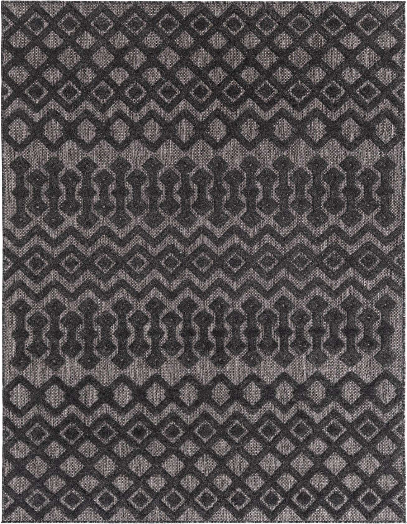 A 5x8 rectangular black and gray tribal trellis rug with a textured high-low pile, suitable for indoor or outdoor use.
