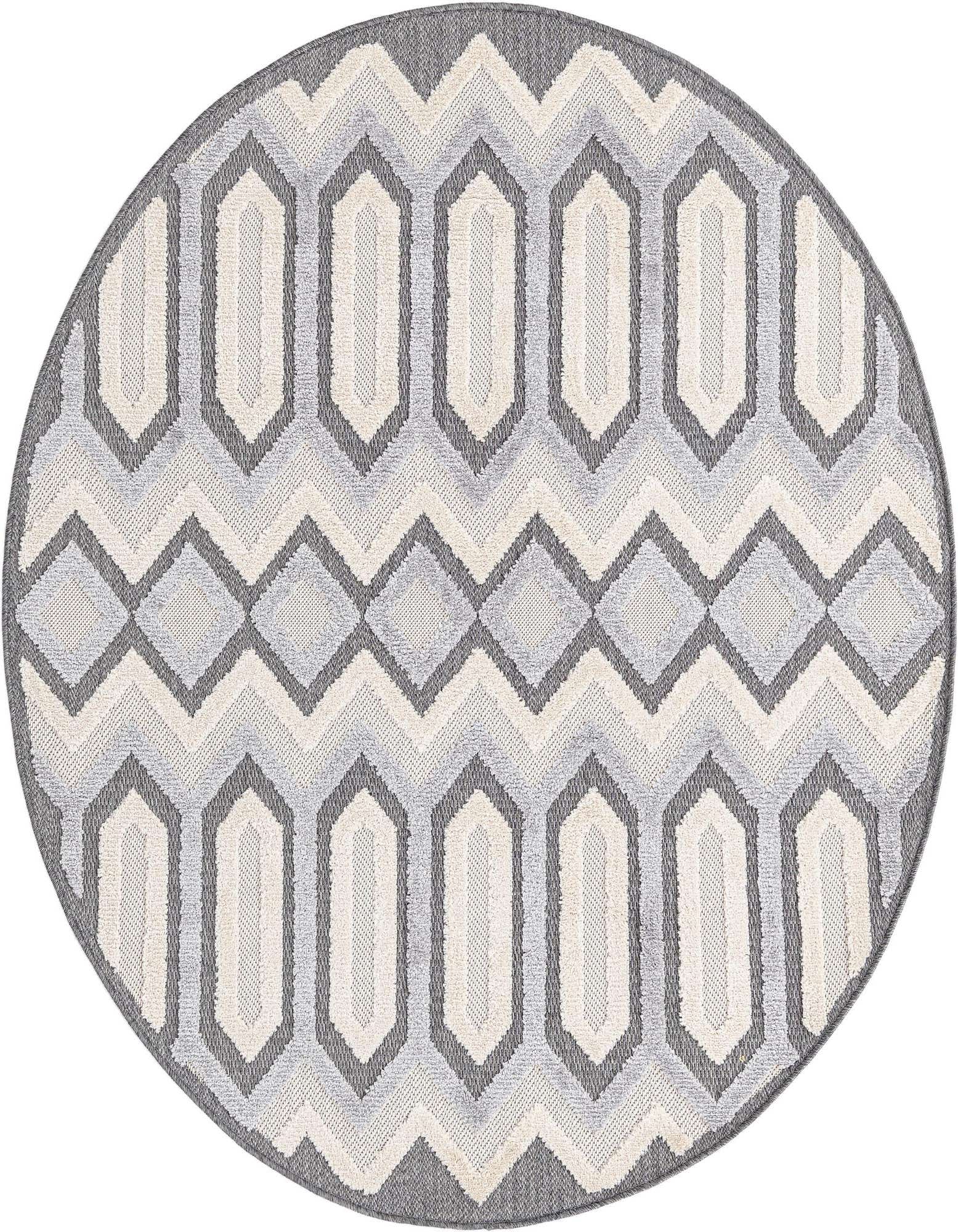 A 5' 3 round Arlo rug features a modern tribal pattern in shades of black, gray, and silver with a high/low textured pile.