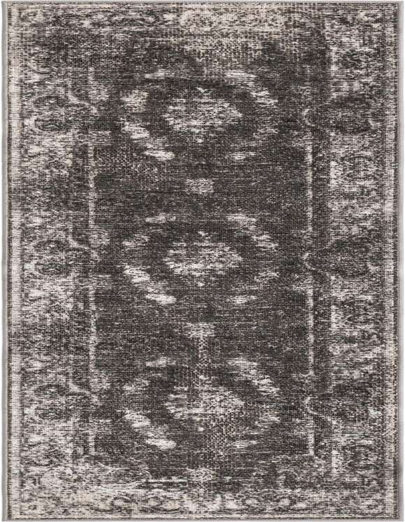 A 7 ft runner rug in black and gray with a distressed traditional pattern, ideal for hallways or patios.