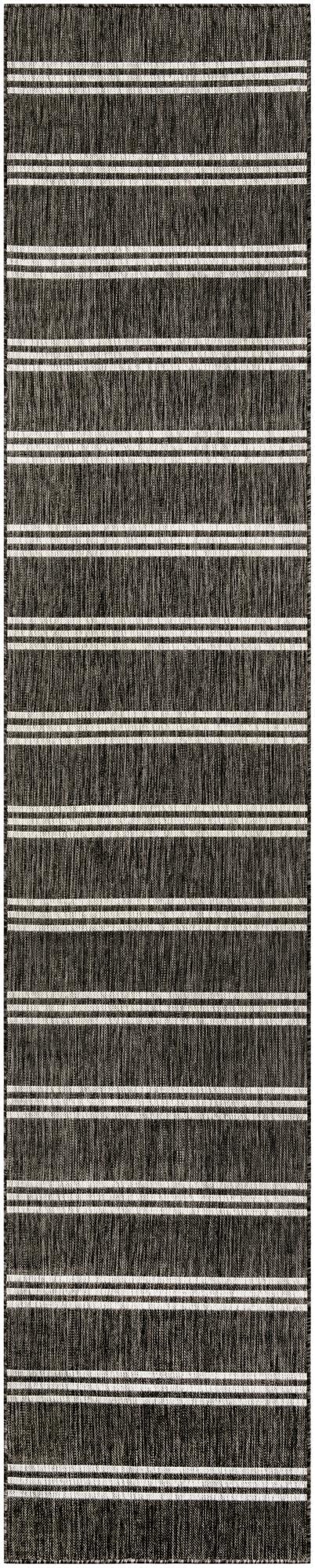 A 13 ft Jill Zarin Outdoor runner rug featuring a textured black and gray background with thin white horizontal stripes, suitable for a hallway or patio.