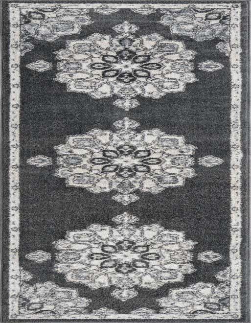 A black 8 ft runner rug with a repeating white and gray traditional medallion pattern, ideal for a hallway or kitchen.