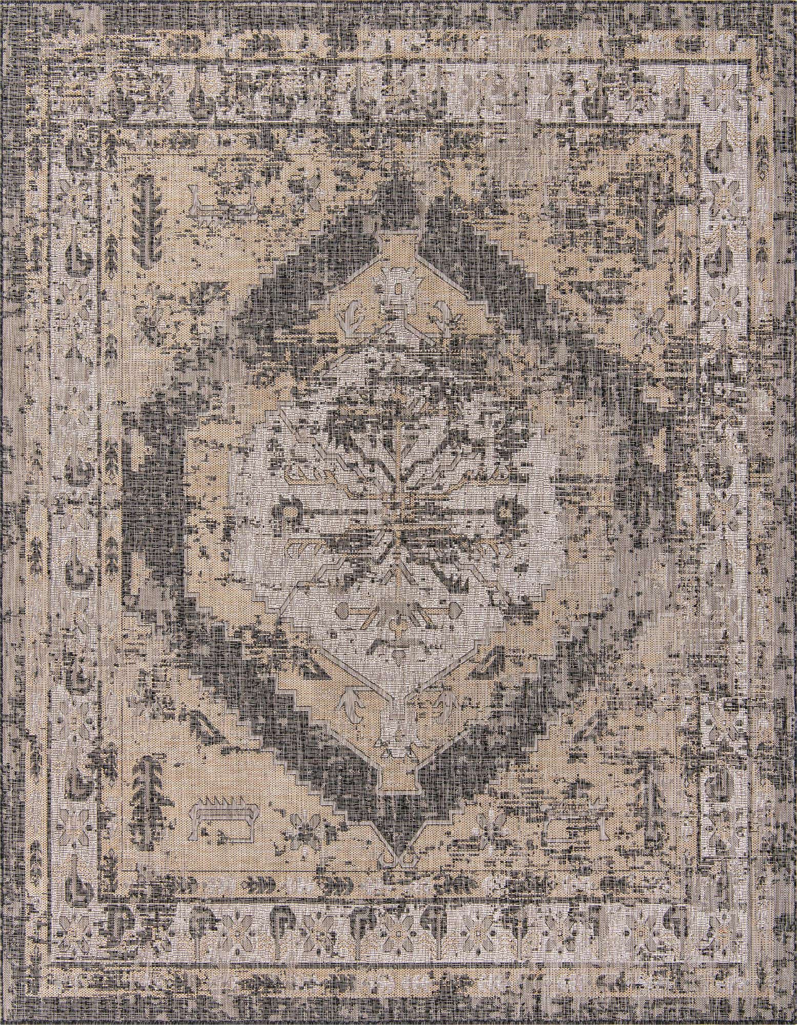 A 13' square Rugs.com Outdoor Traditional rug featuring a distressed Southwestern pattern in black, gray, and beige.
