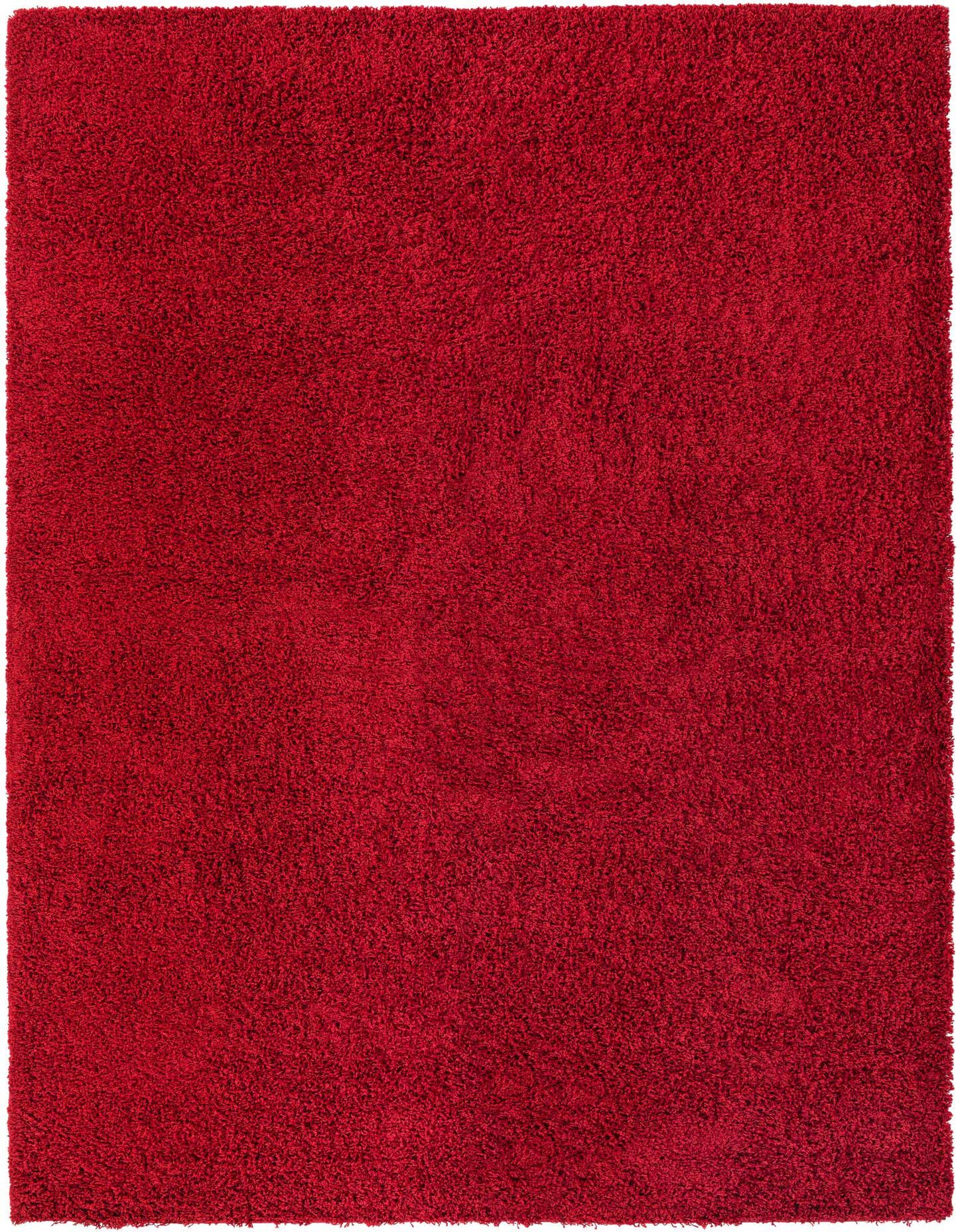 A vibrant 8x11 rectangular red shag rug, showcasing its plush, textured pile, ideal for a modern living room or bedroom.