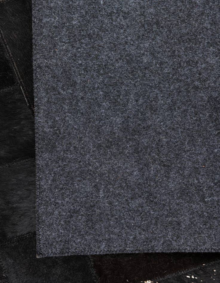 Detail image of  4' 10 x 8' Cowhide Leather Rug