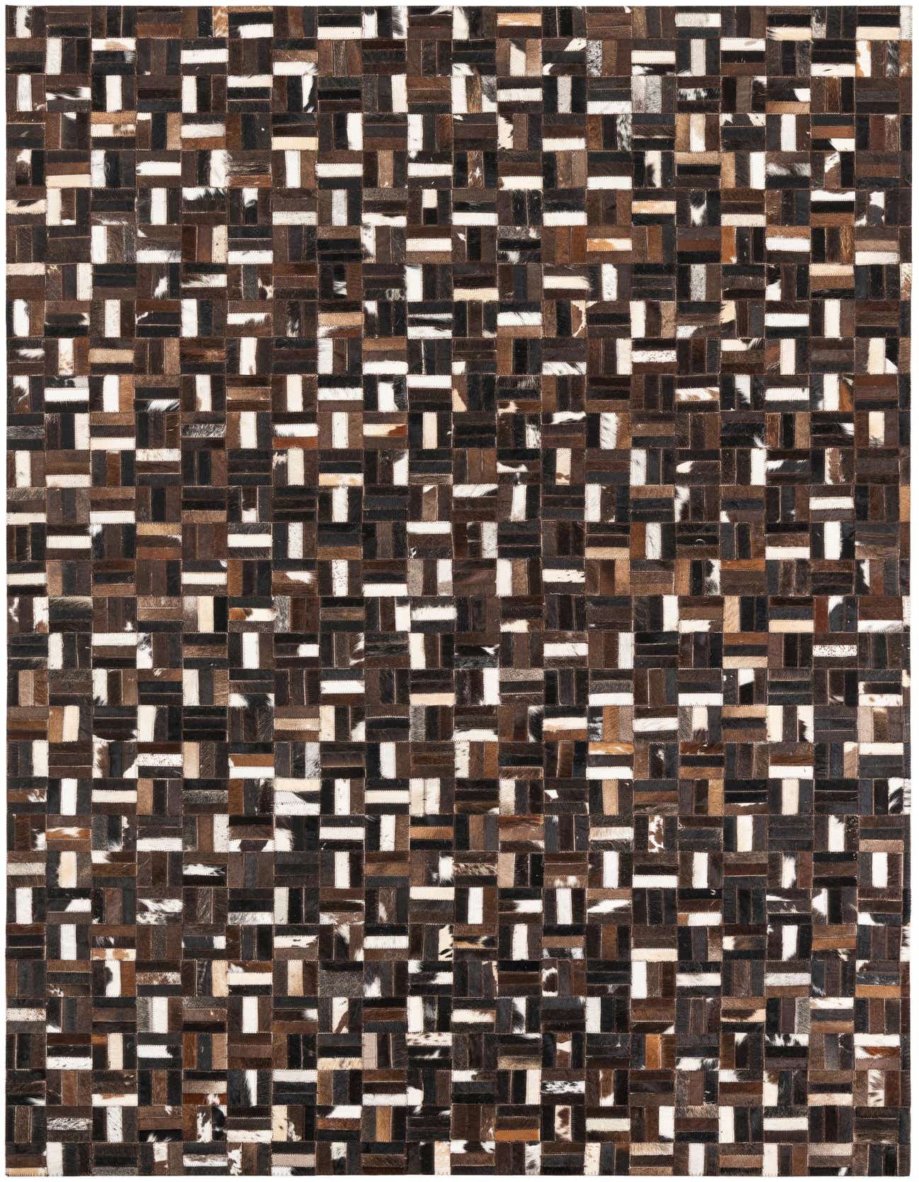 A rectangular 5x8 modern rug made from patchwork cowhide and leather in varying shades of brown, tan, and white, suitable for a living room.