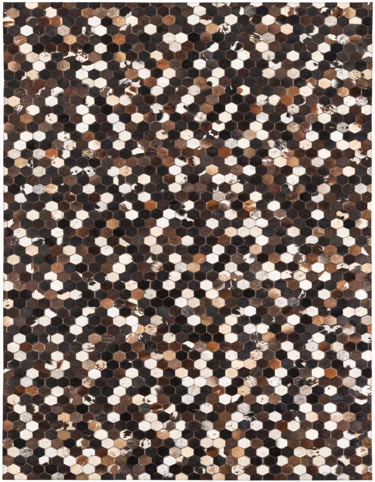 A 5x8 rectangular Cowhide & Leather rug featuring a modern honeycomb pattern in various shades of brown, tan, black, and white.