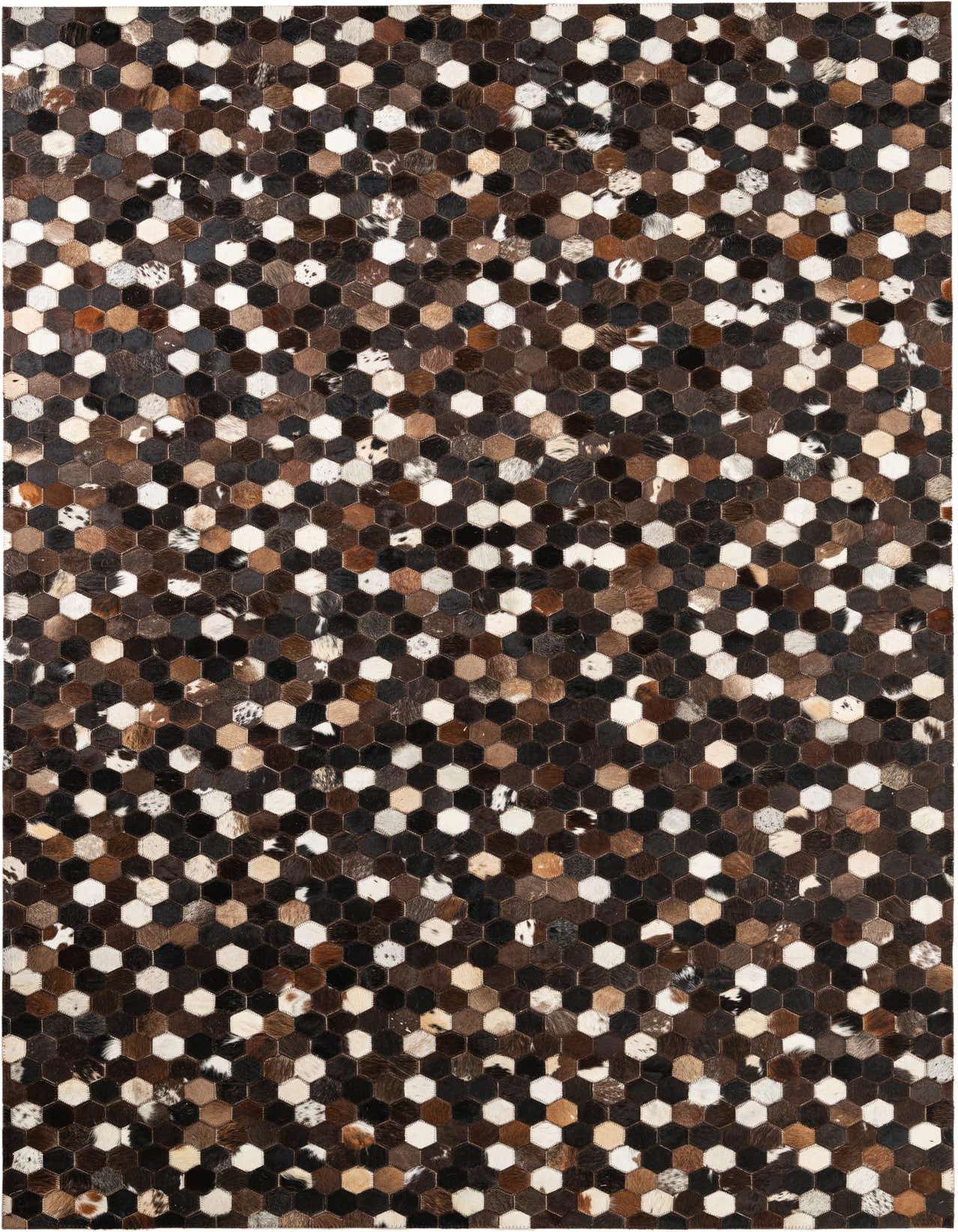 A rectangular 5x8 modern cowhide rug featuring a mosaic of hexagonal patches in various shades of brown, tan, black, and white.