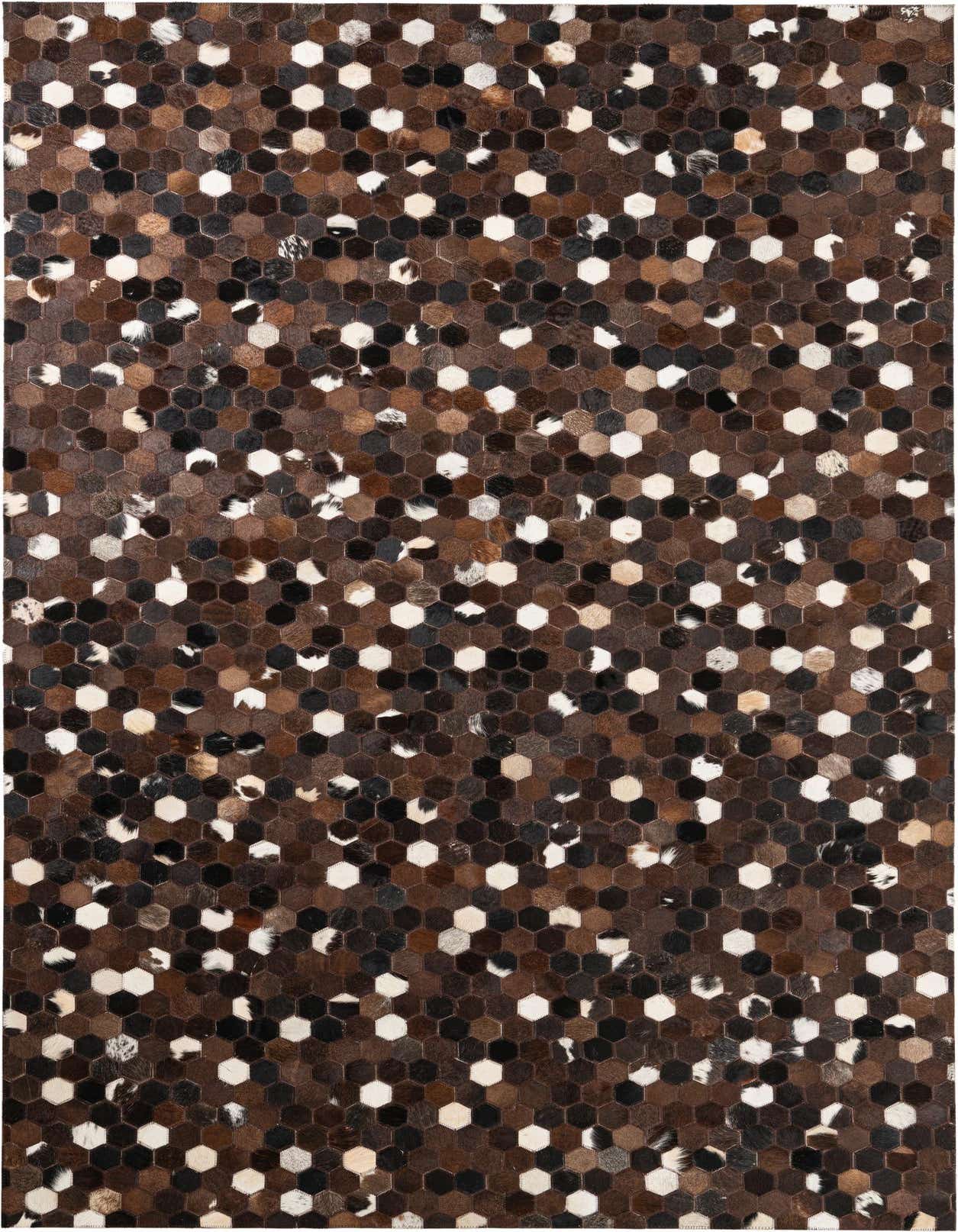 A 5x8 rectangular Cowhide Leather rug featuring a modern, abstract pattern of brown, tan, black, and white hexagonal patches.