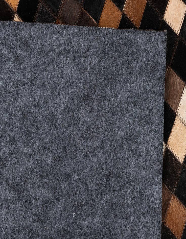 Detail image of  5' 1 x 8' 1 Cowhide Leather Rug