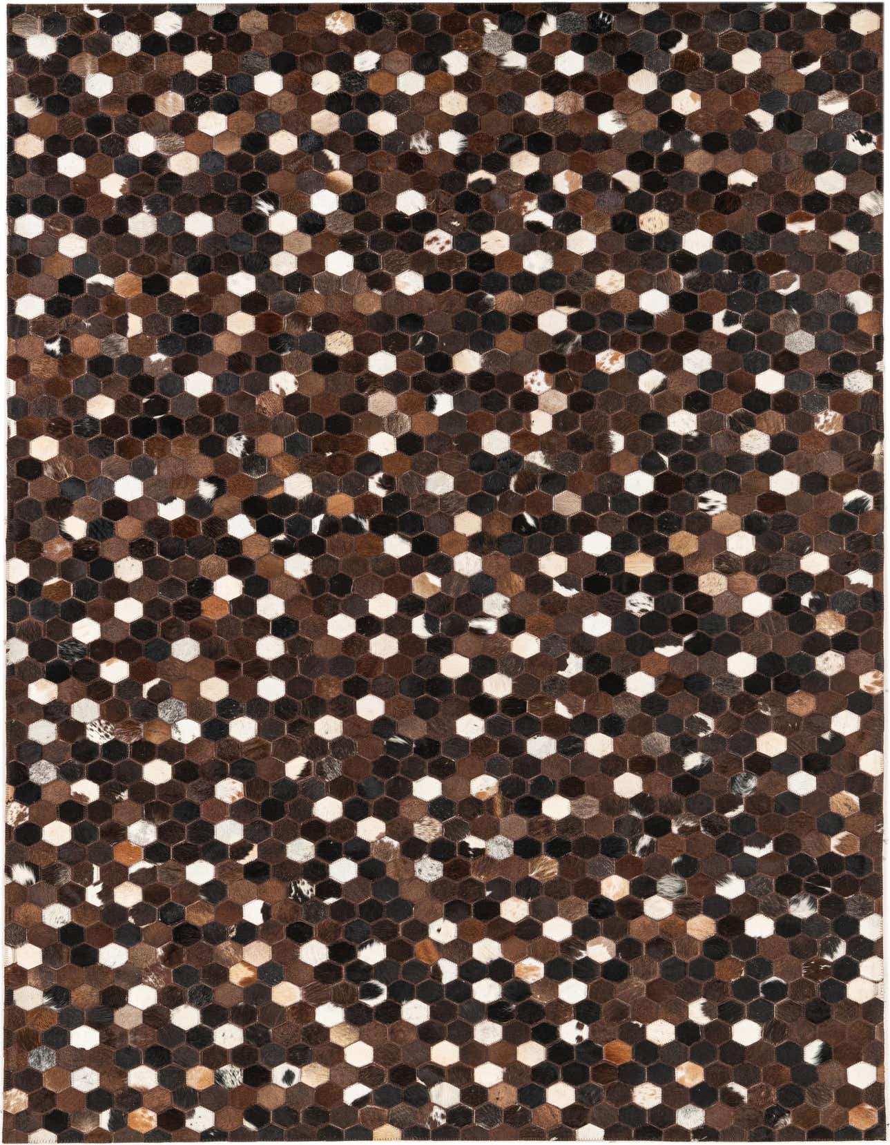 A 5x8 rectangular Cowhide Leather rug featuring a modern, abstract pattern of small hexagonal patches in varying shades of brown, tan, black, and white.