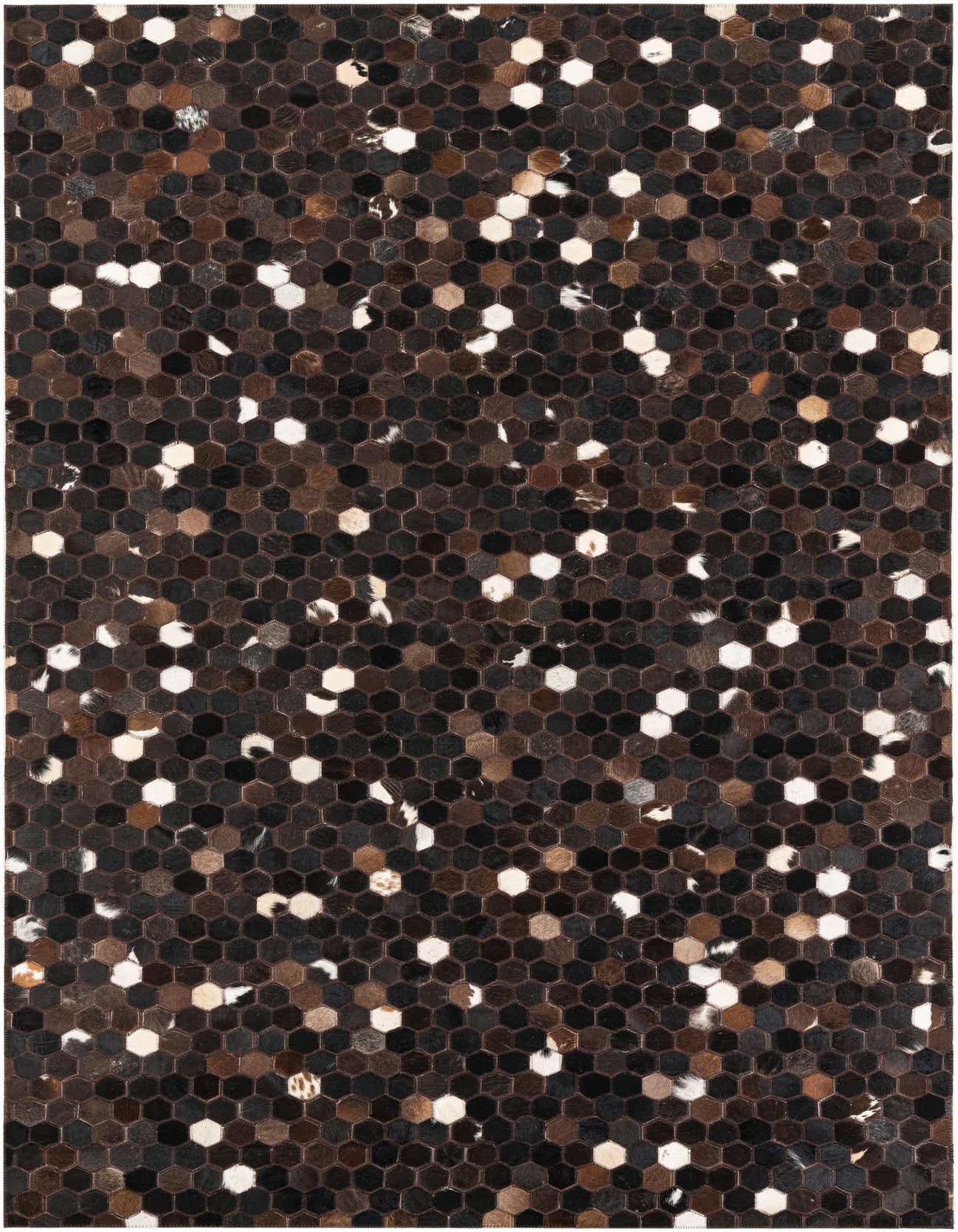 A 5x8 rectangular Cowhide & Leather rug featuring a modern, abstract pattern of hexagonal patches in varying shades of brown, tan, black, and white.
