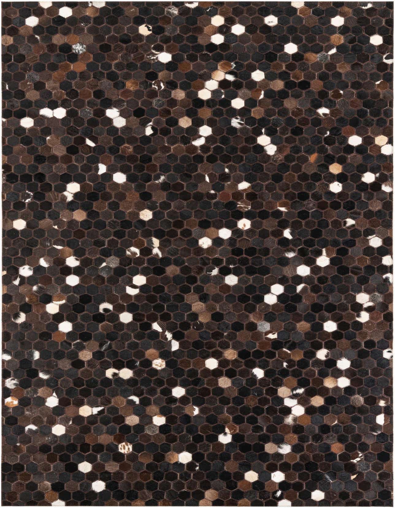 A 5x8 rectangular Cowhide Leather rug featuring a modern abstract pattern of brown, tan, black, and white hexagonal cowhide patches.