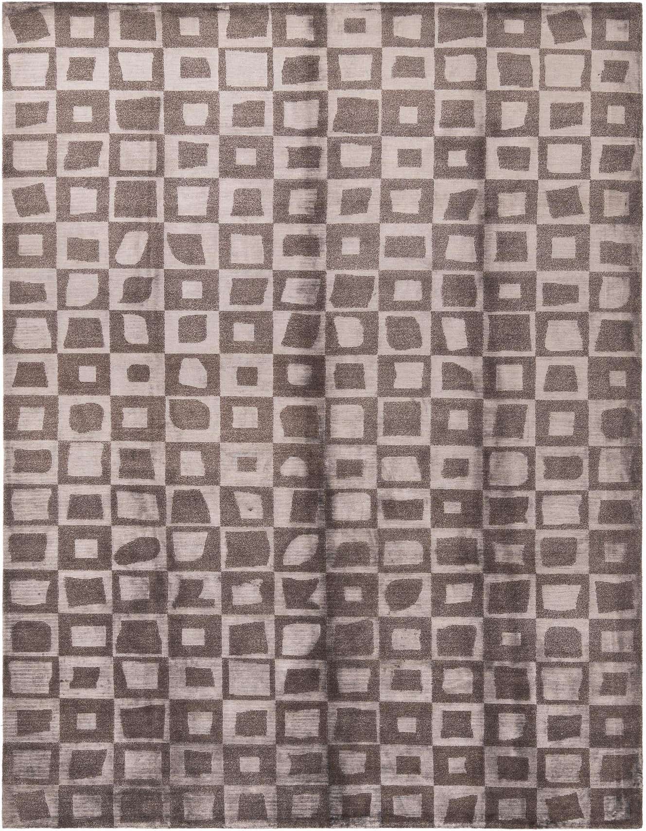 A 7x10 rectangular Darya rug with a modern geometric pattern in varying shades of brown and tan.