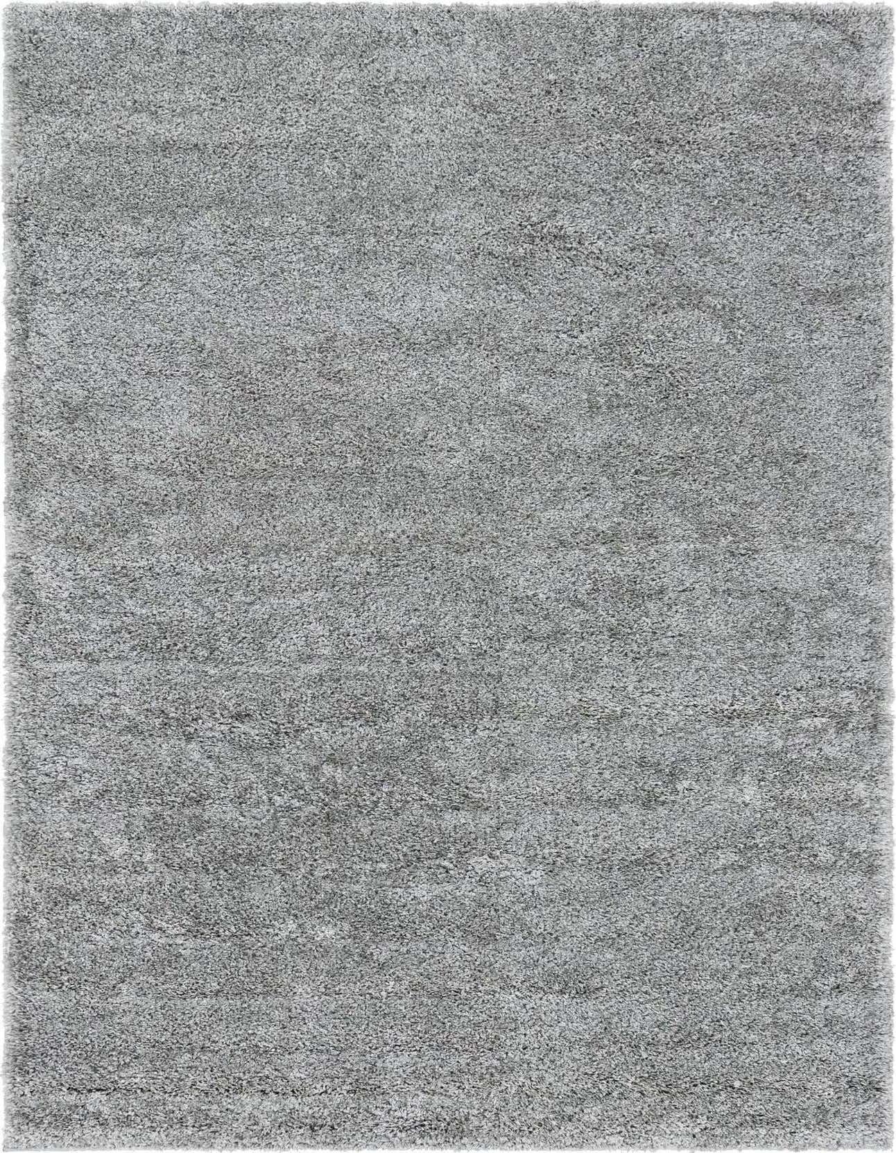A soft, rectangular 5x8 gray shag area rug with a textured pile, perfect for a modern living room or bedroom.
