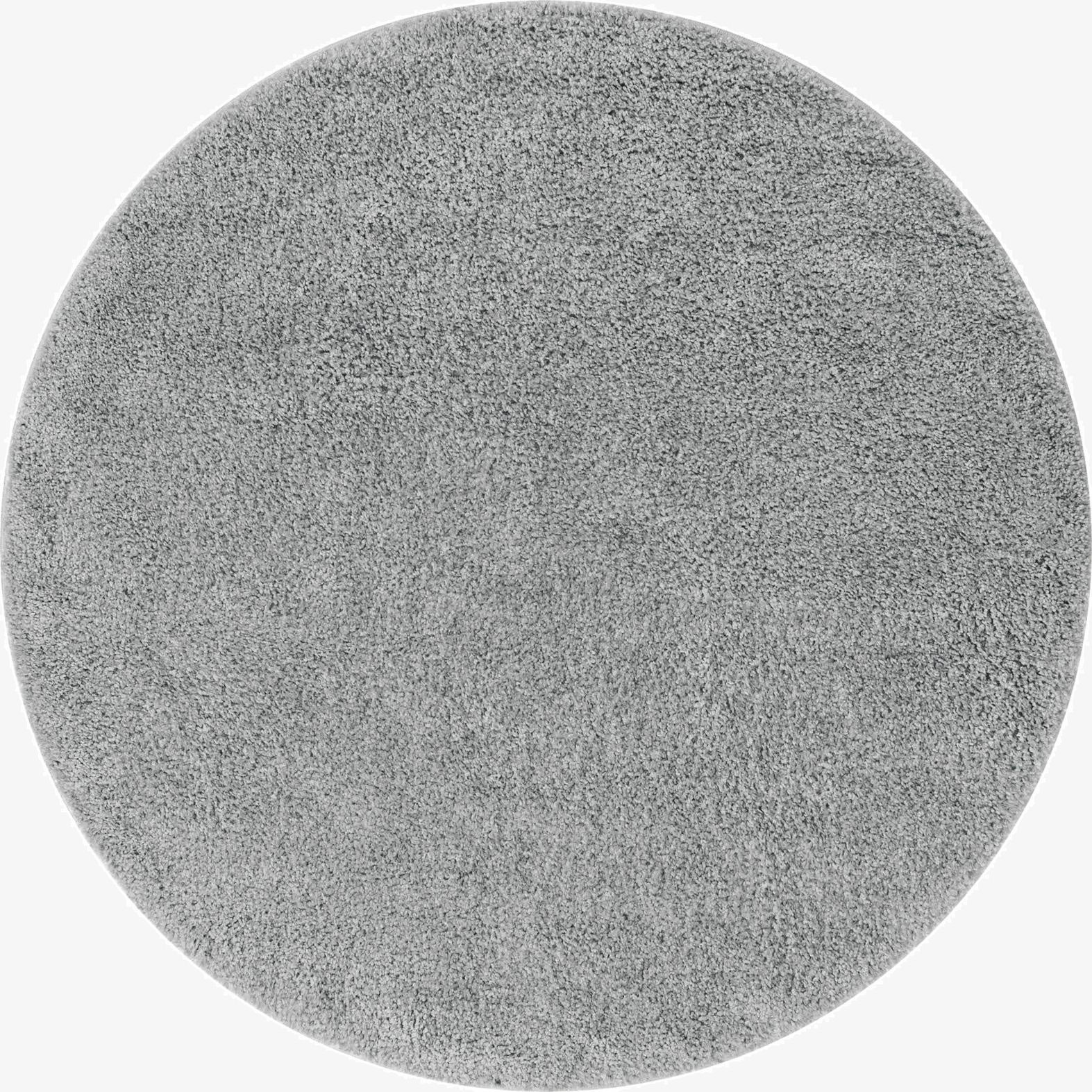 A soft gray round shag rug, 4' 0 x 4' 0, with a plush, textured pile, suitable for modern indoor spaces.