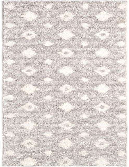 A long 8 ft runner rug in gray with a modern diamond pattern in white, featuring a textured pile.