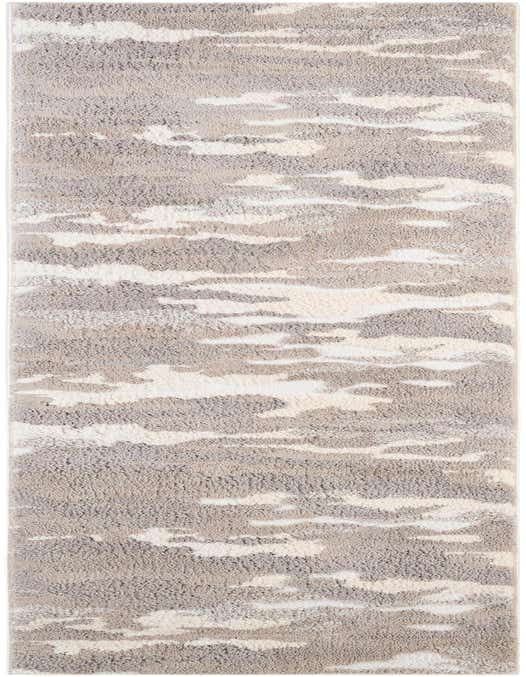 A 10 ft runner rug with a modern abstract pattern in varying shades of gray, silver, and off-white, featuring a textured medium pile.