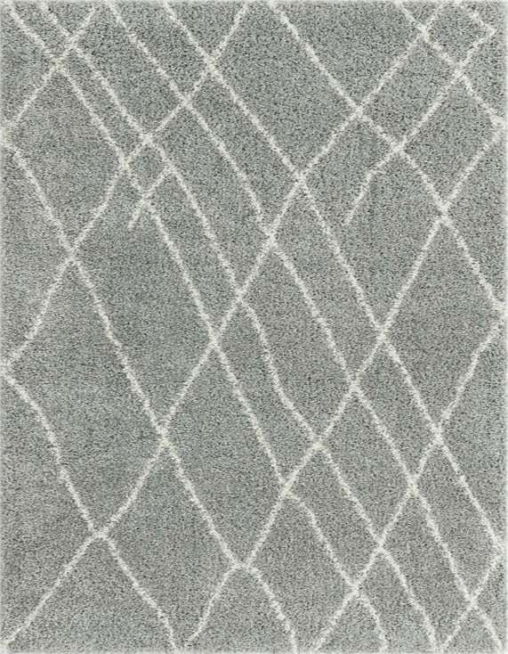 A gray shag runner rug with a subtle white diamond lattice pattern, perfect for a hallway.
