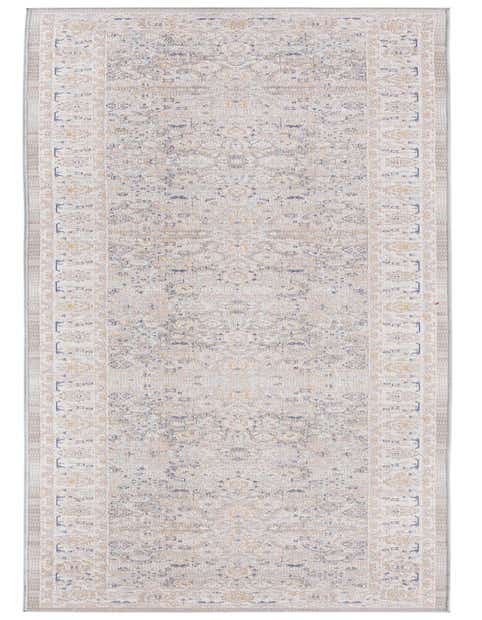 A 12 ft runner rug from the Whitney Collection, featuring a distressed traditional botanical pattern in grays, silvers, and subtle gold tones.