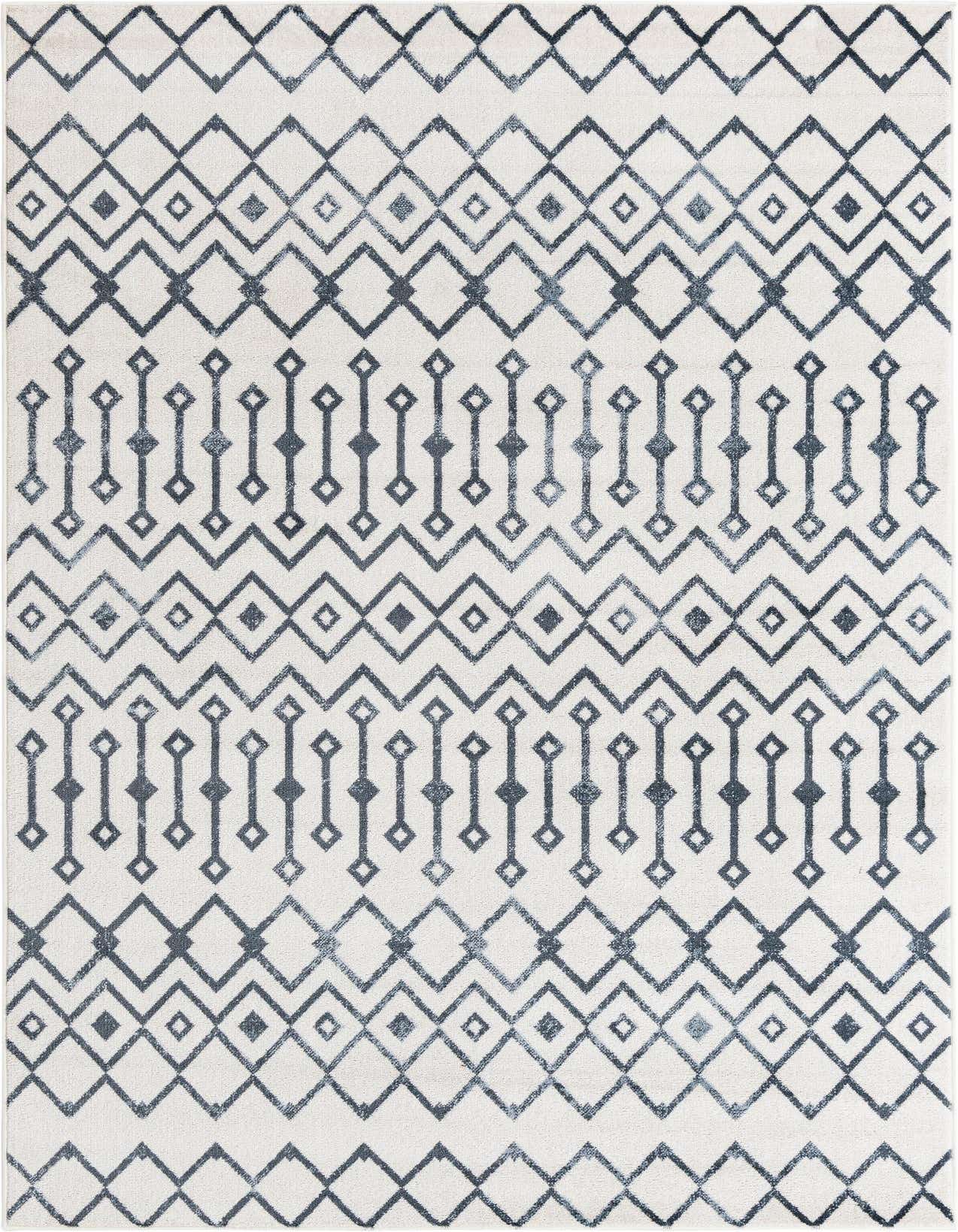 A 6x9 rectangular rug featuring a distressed blue tribal trellis pattern on an ivory background, ideal for a living room.