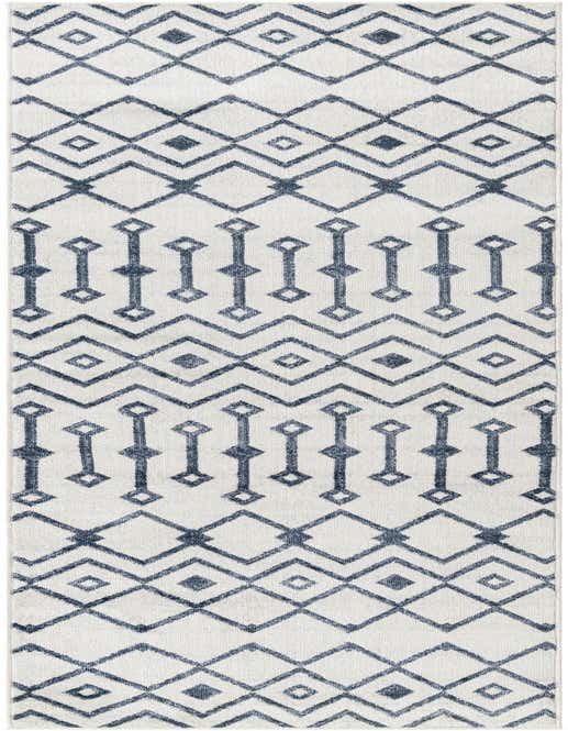 A 10 ft runner rug with a bohemian trellis pattern in shades of blue and ivory, perfect for a hallway.