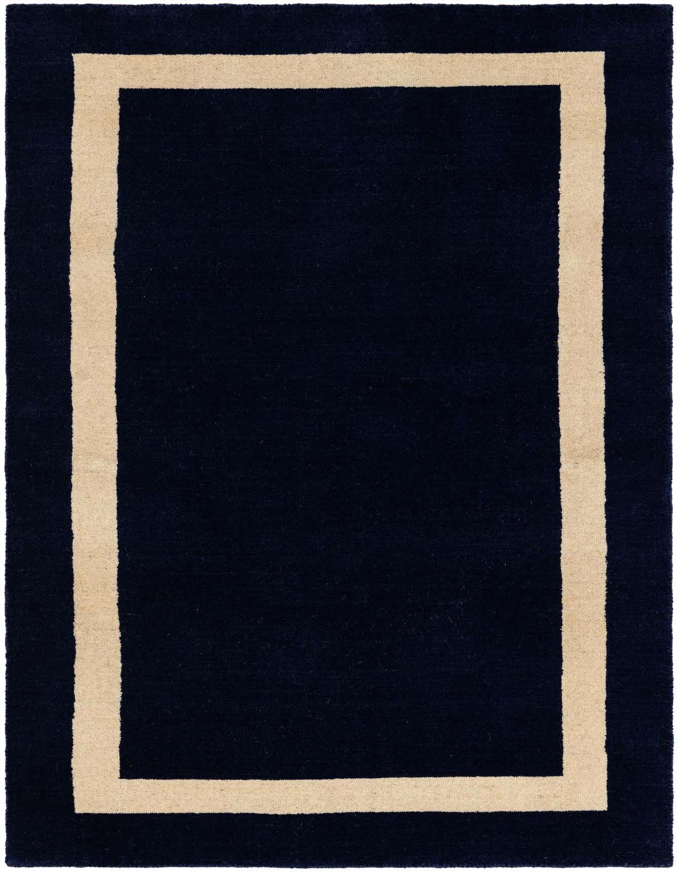A 3x5 rectangular Jill Zarin Border Wool rug in deep cobalt blue with a clean, light beige border.