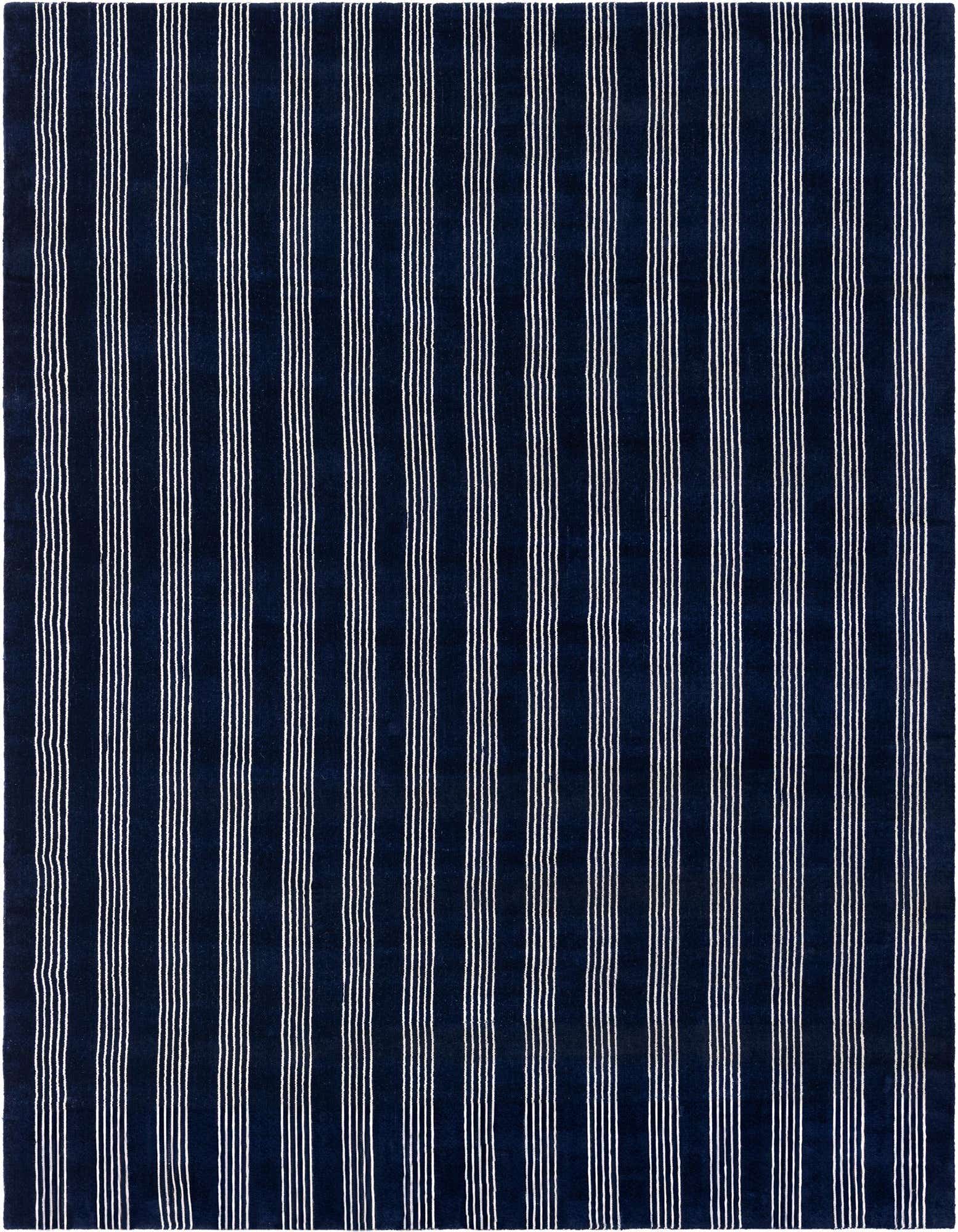 A rectangular 8x10 Jill Zarin Striped Wool rug in cobalt blue with thin white vertical stripes, suitable for a living room.