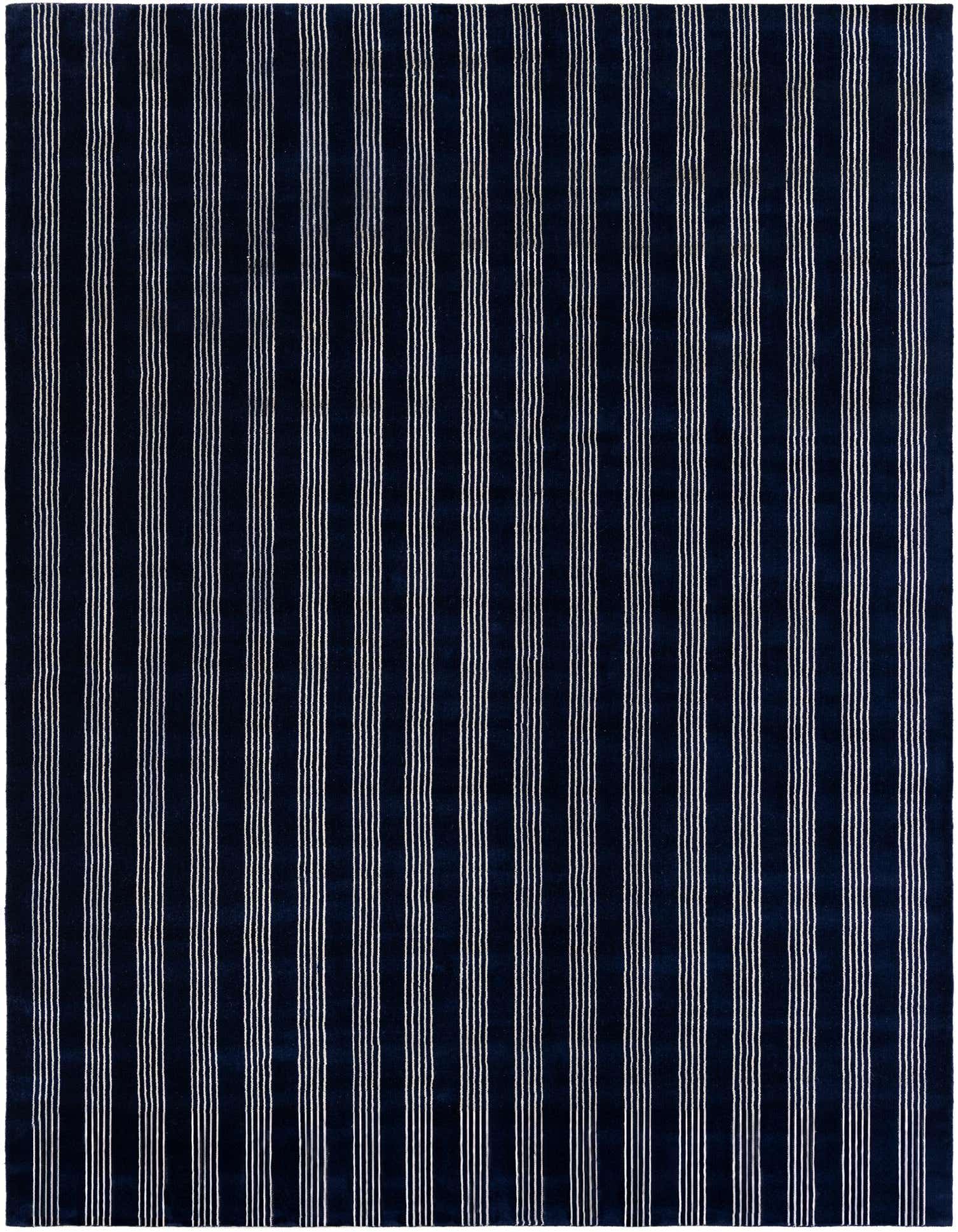 A 9x12 rectangular Jill Zarin Striped Wool rug in cobalt blue with thin white vertical stripes, suitable for a modern living room.