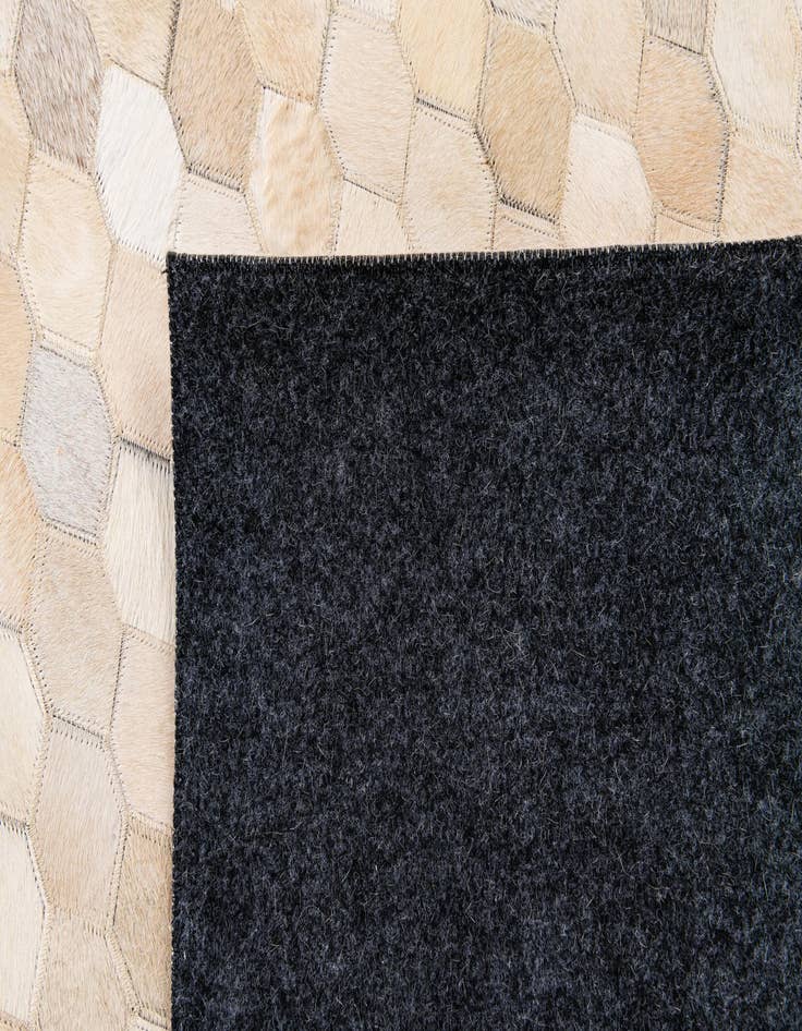 Detail image of  6' 8 x 9' 10 Cowhide Stocks Rug