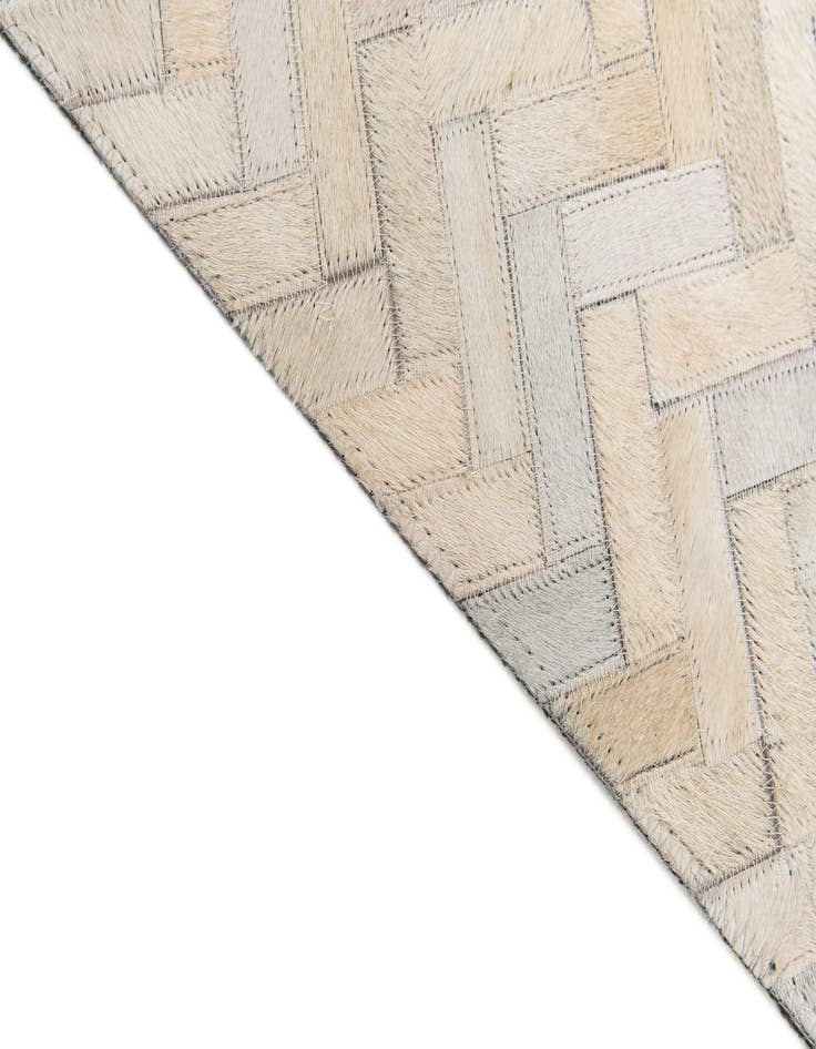 Detail image of  4' 10 x 7' 10 Cowhide Stocks Rug