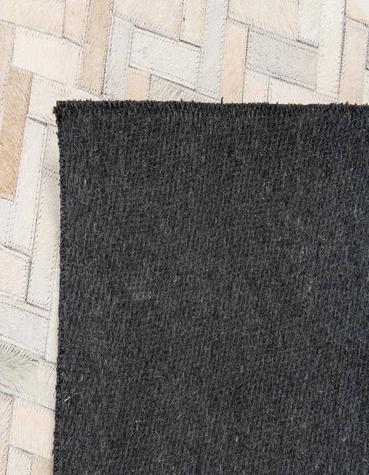 Detail image of  4' 10 x 7' 10 Cowhide Stocks Rug