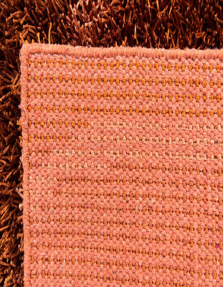 Detail image of  4' 2 x 5' 9  Hand Knotted Two-Tone Shag Rug