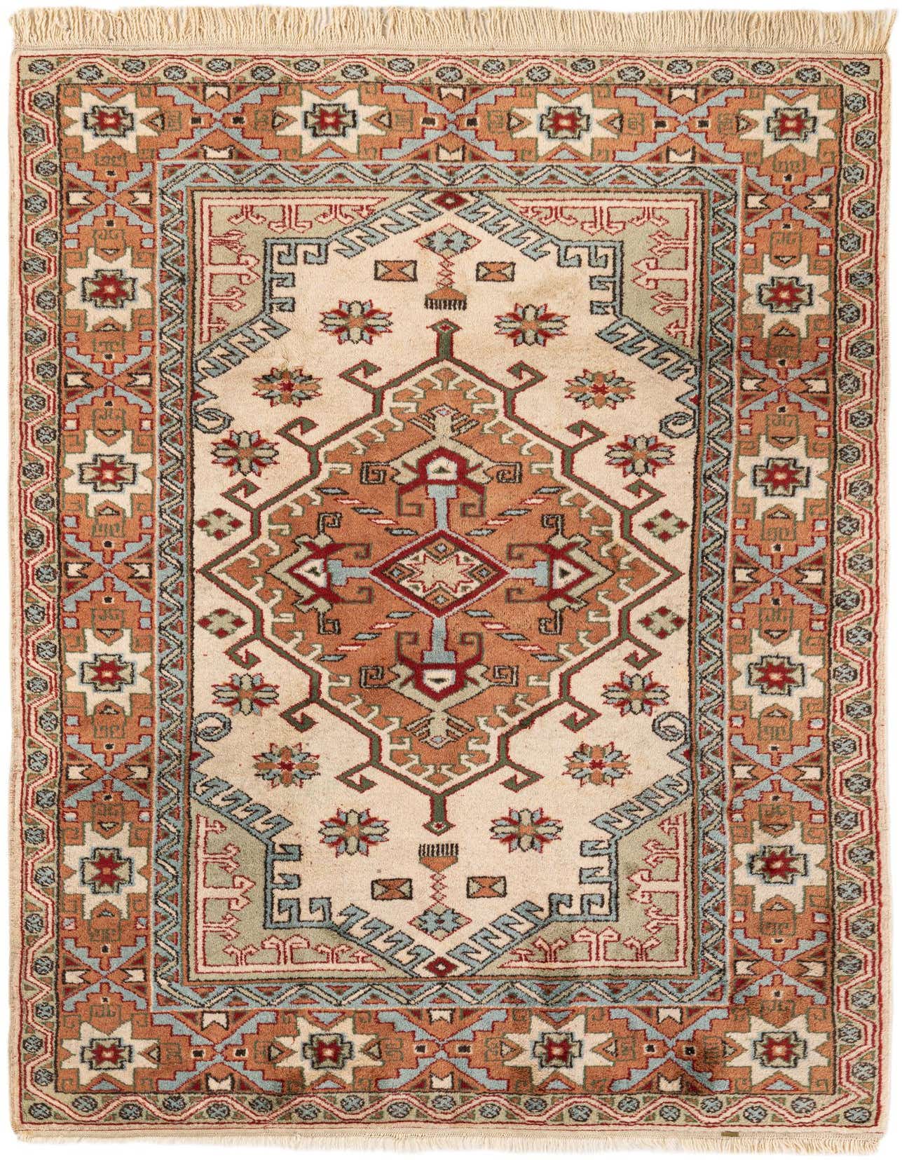 A 5x7 rectangular Anatolian wool rug featuring a traditional medallion pattern in ivories, creams, and earthy tones.