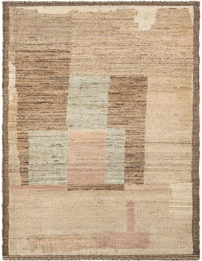 Handmade rectangular Beni Marok rug in ivory and cream with subtle brown, blue, and pink abstract patterns, suitable for an indoor living space.