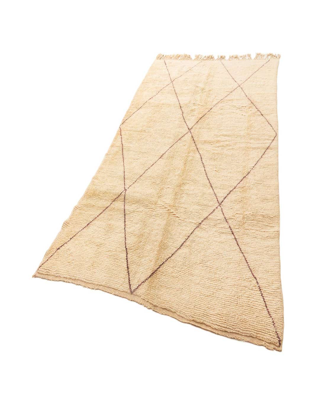 A 6x9 rectangular ivory wool rug with a subtle geometric crisscross pattern in a darker tone, suitable for a living room.