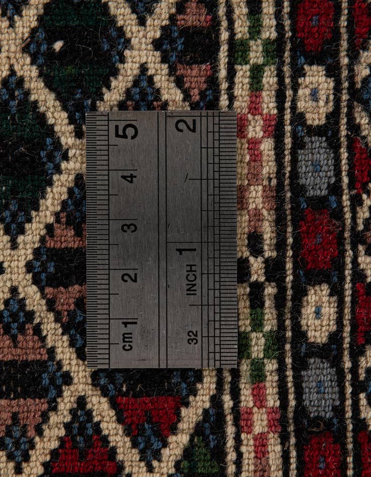 Detail image of  4' 3 x 6' 1  Hand Knotted Bokhara Oriental Wool Rug
