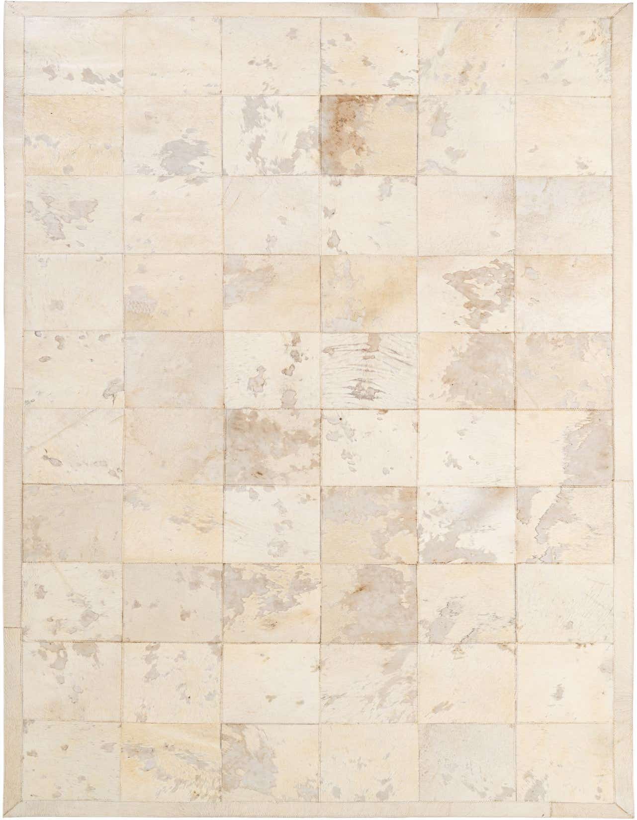 A 5x8 rectangular ivory cowhide patchwork rug with natural variations in cream and light brown tones, suitable for a modern living room.