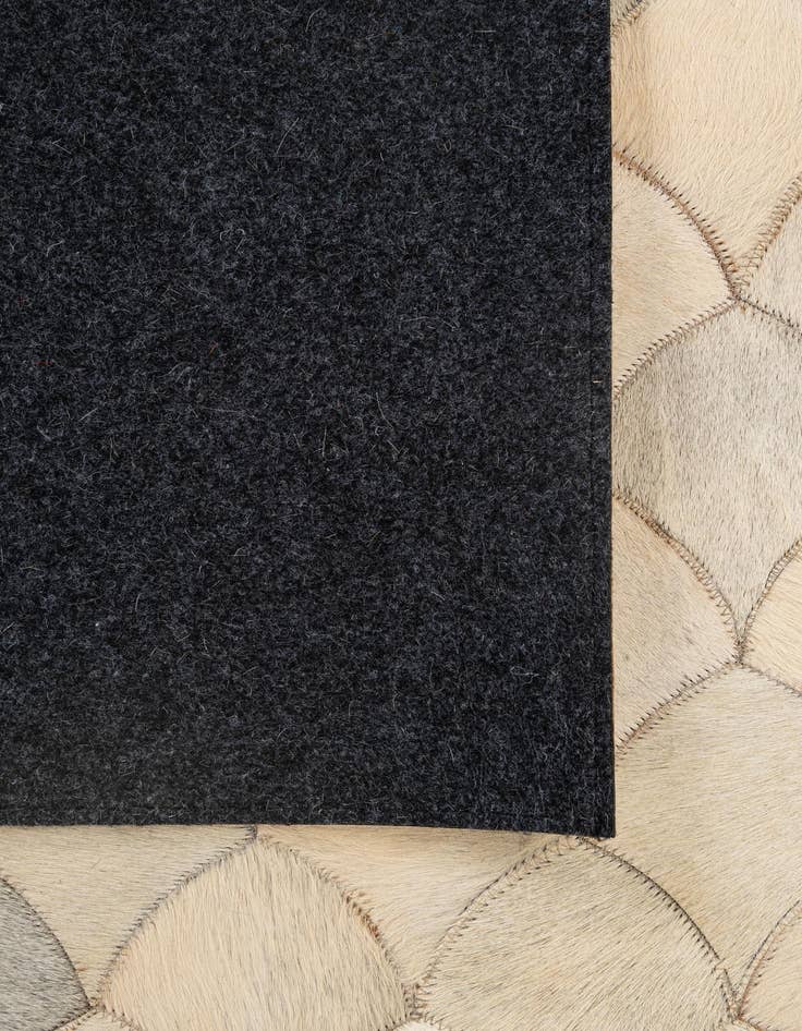 Detail image of  5' x 7' 11 Cowhide - Patchwork Rug