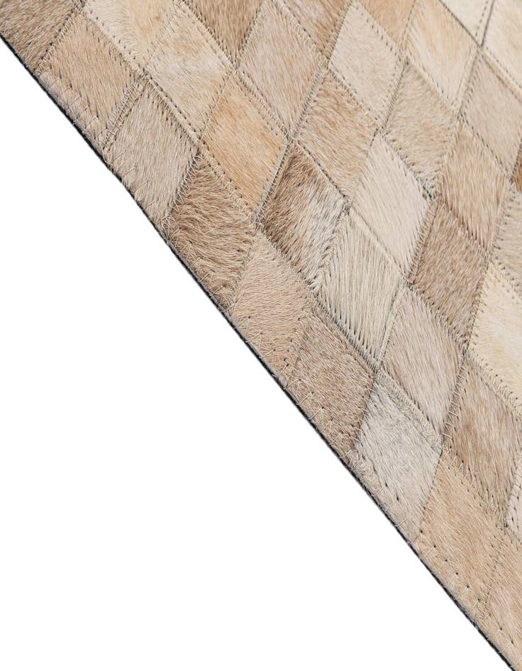 Detail image of  5' 2 x 8' Cowhide - Patchwork Rug