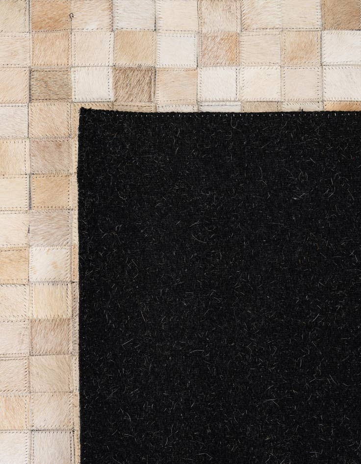 Detail image of  5' 2 x 8' Cowhide - Patchwork Rug