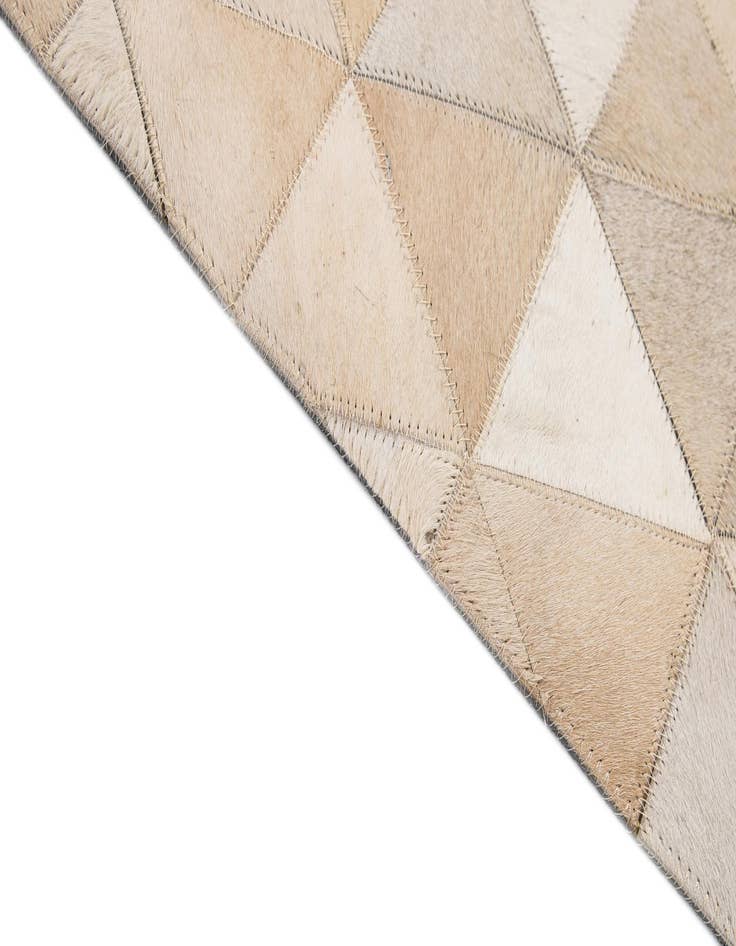 Detail image of  5' 2 x 8' 2 Cowhide - Patchwork Rug